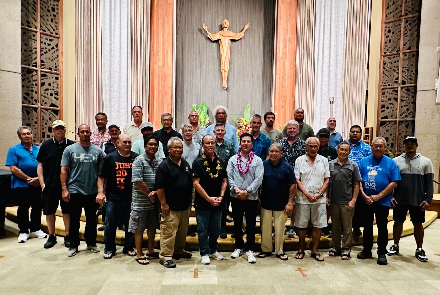 Men of the fellowship gathered before the altar